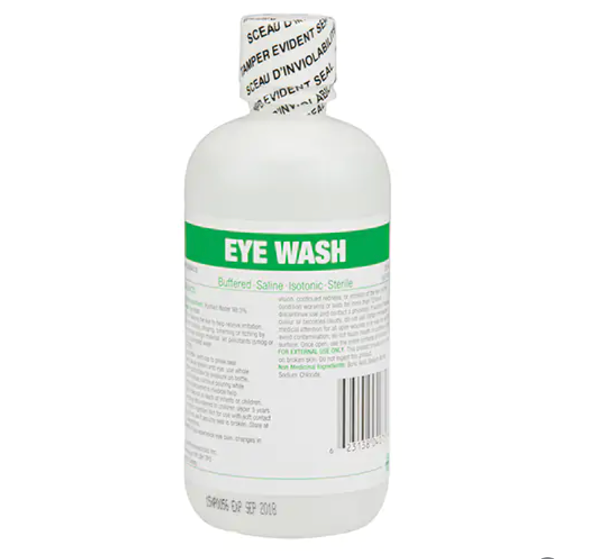 Bouteille de solution pour le lavage oculaire, contenant une solution saline tamponnée stérile, utilisée pour rincer et apaiser les yeux en cas de contact avec des substances irritantes.