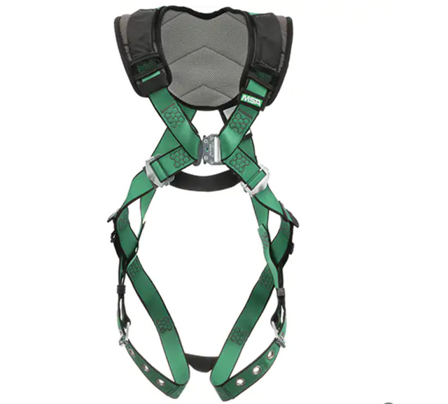 Harnais de sécurité vert et noir de marque MSA avec rembourrage au niveau des épaules, boucles à dégagement rapide, et sangles ajustables aux cuisses et à la taille pour un confort et une sécurité optimaux en hauteur.