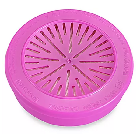 Filtre à particules Honeywell P100 de couleur rose, modèle 7580P100, conçu pour les masques respiratoires à cartouche, assurant une protection contre les particules solides et liquides.