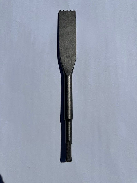 Black metal SDS Plus chisel tool with 1-1/16" wide flat blade and grooved tip.