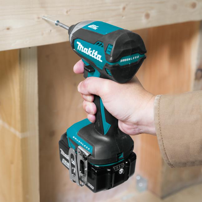 Makita 18V impact driver used to drive screws into wood framing