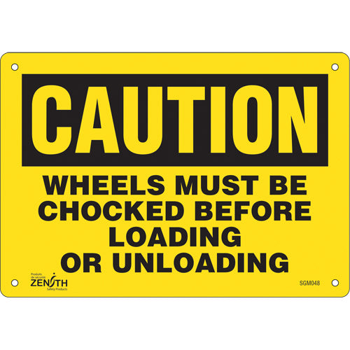 Enseigne «Wheels Must Be Chocked» en anglais pour signalisation de sécurité